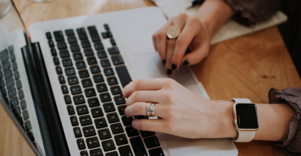 woman coding on computer
