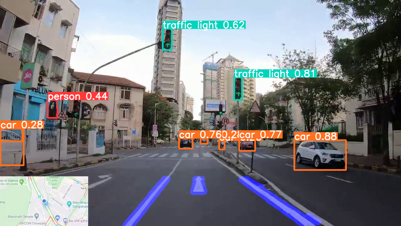 A dashcam street view with detection boxes labeling cars, a person, and traffic lights, and lane markings overlaid